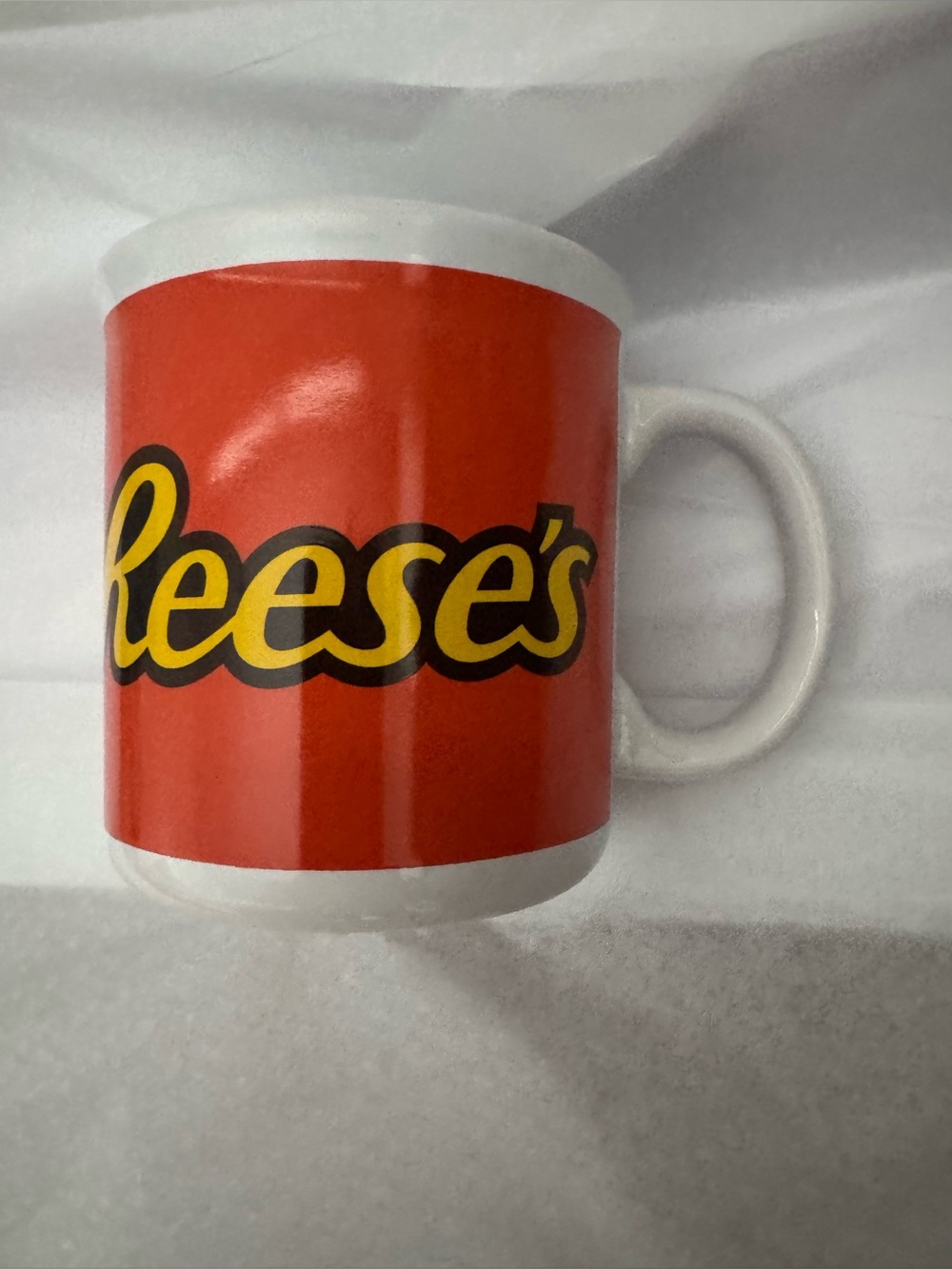 Reese's Branded Orange Ceramic Coffee Mug - Bold Logo Design